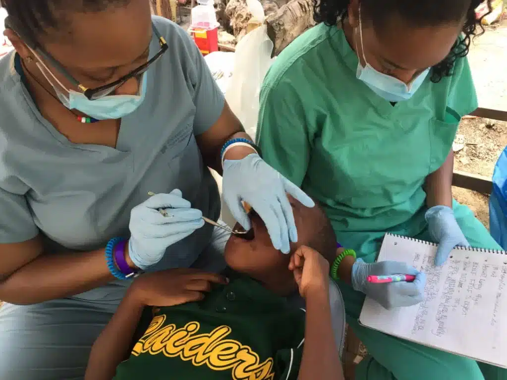 Dr. Jackson providing dental care during a mission trip to Haiti